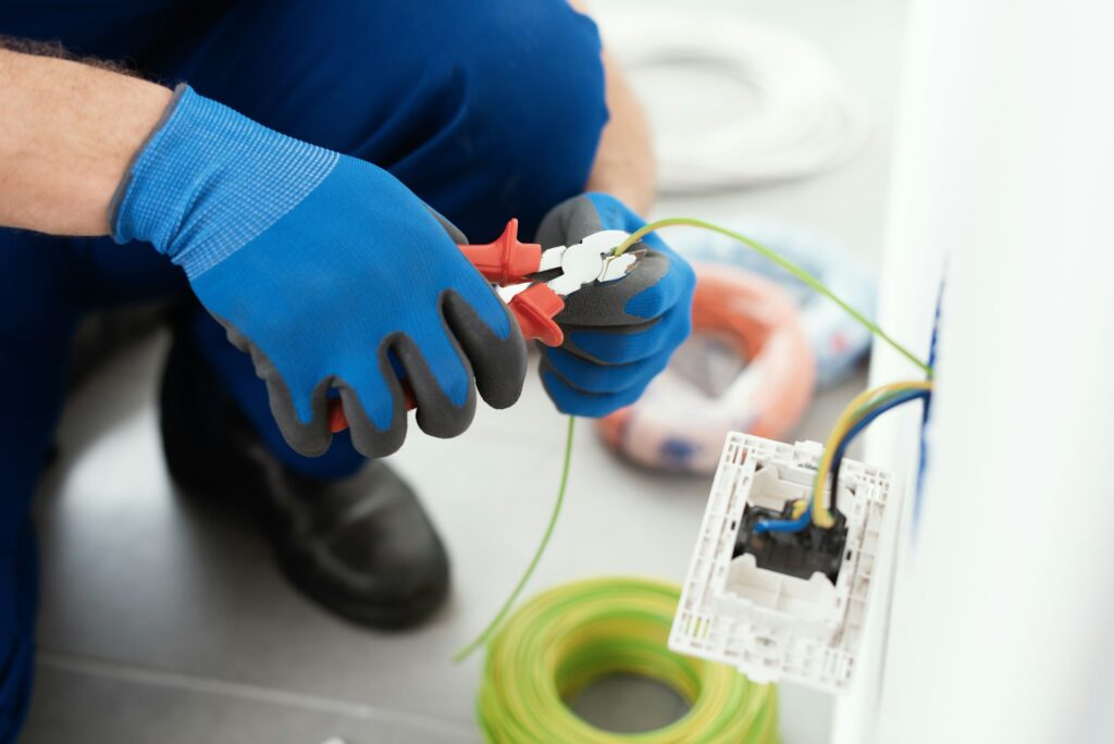 Professional electrician working on the electrical system